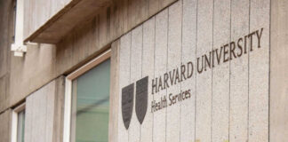 Harvard University Health Services building sign and emblem